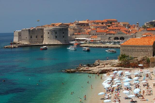 people enjoying the sun on the beaches of dubrovnik croatia