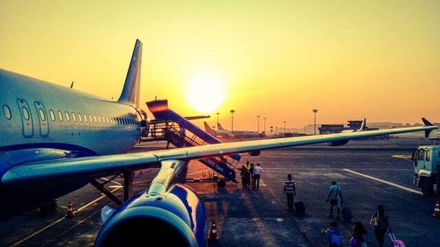 people boarding a plane